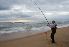Man surf fishing at The Point in Buxton.